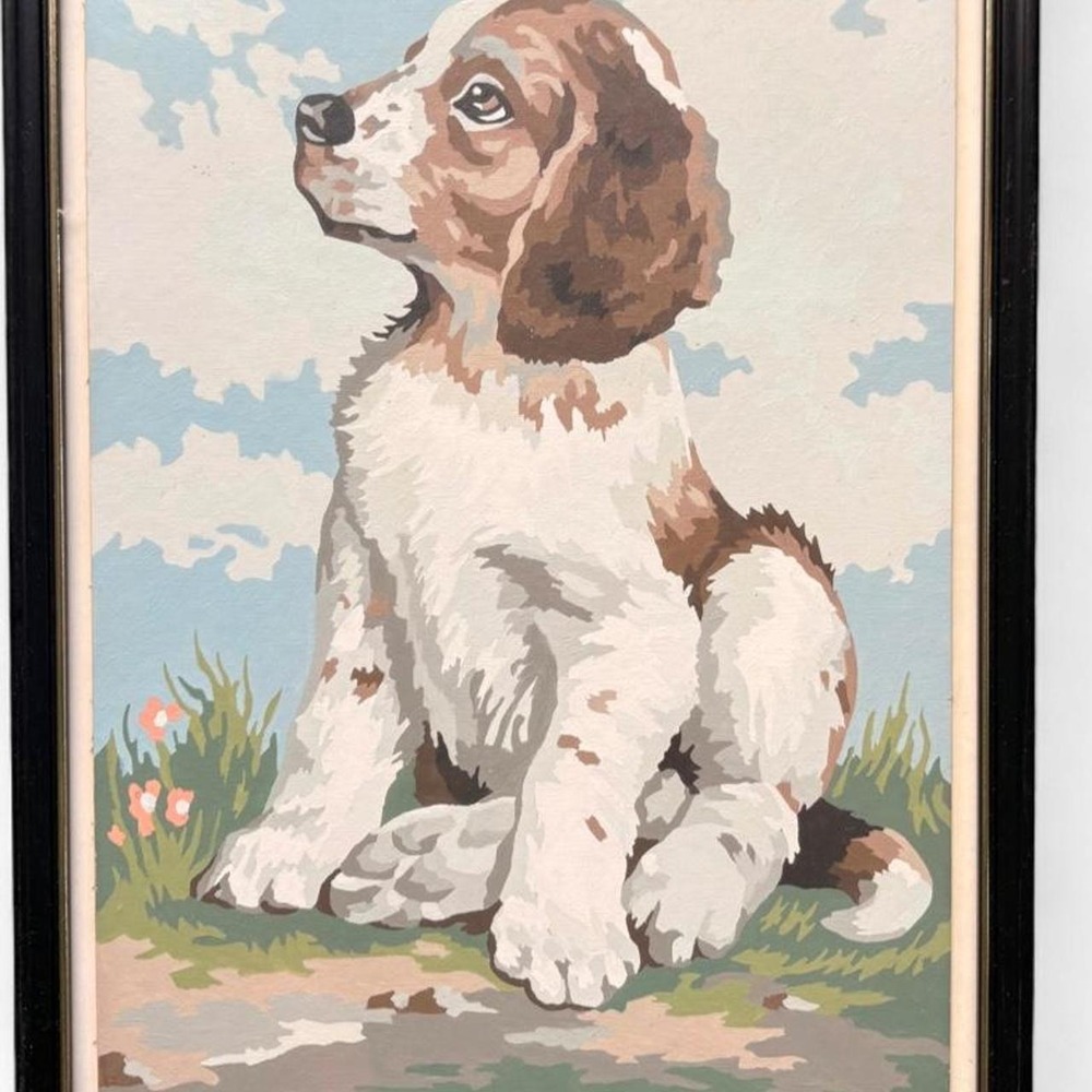 Vintage mid-century paint-by-number artwork featuring a brown white spaniel.